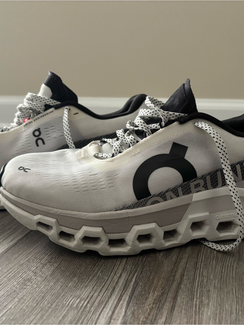 On Running Cloudmonster Sneakers in White and Black